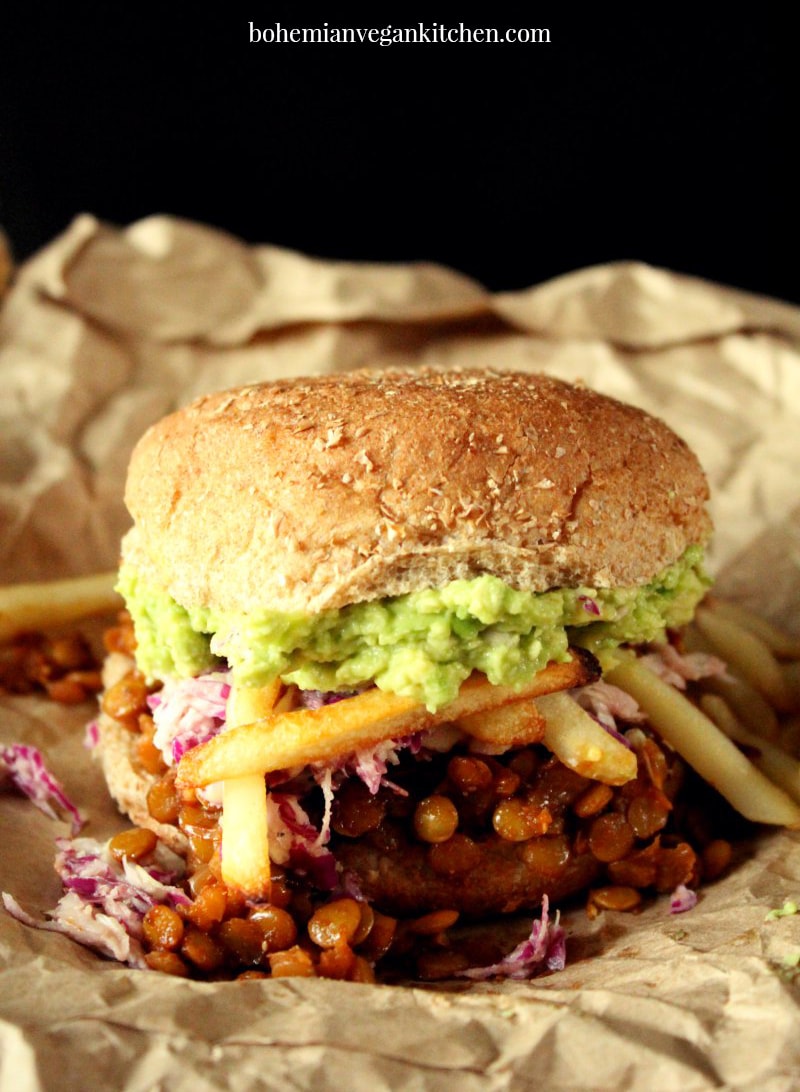Making the Ultimate Vegan Sloppy Joe makes me want to sing like Adam Sandler! Loaded down with homemade slaw, avocado, and oven baked fries, this is one delicious ritual you don't want to miss! #vegansloppyjoes #vegansloppyjoeslentil #vegansloppyjoeseasy #vegansloppyjoesbest #bohemianvegankitchen