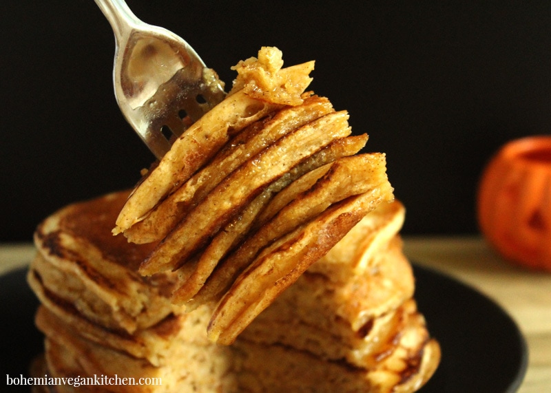 picture of a fork with a bite of vegan pumpkin pancakes
