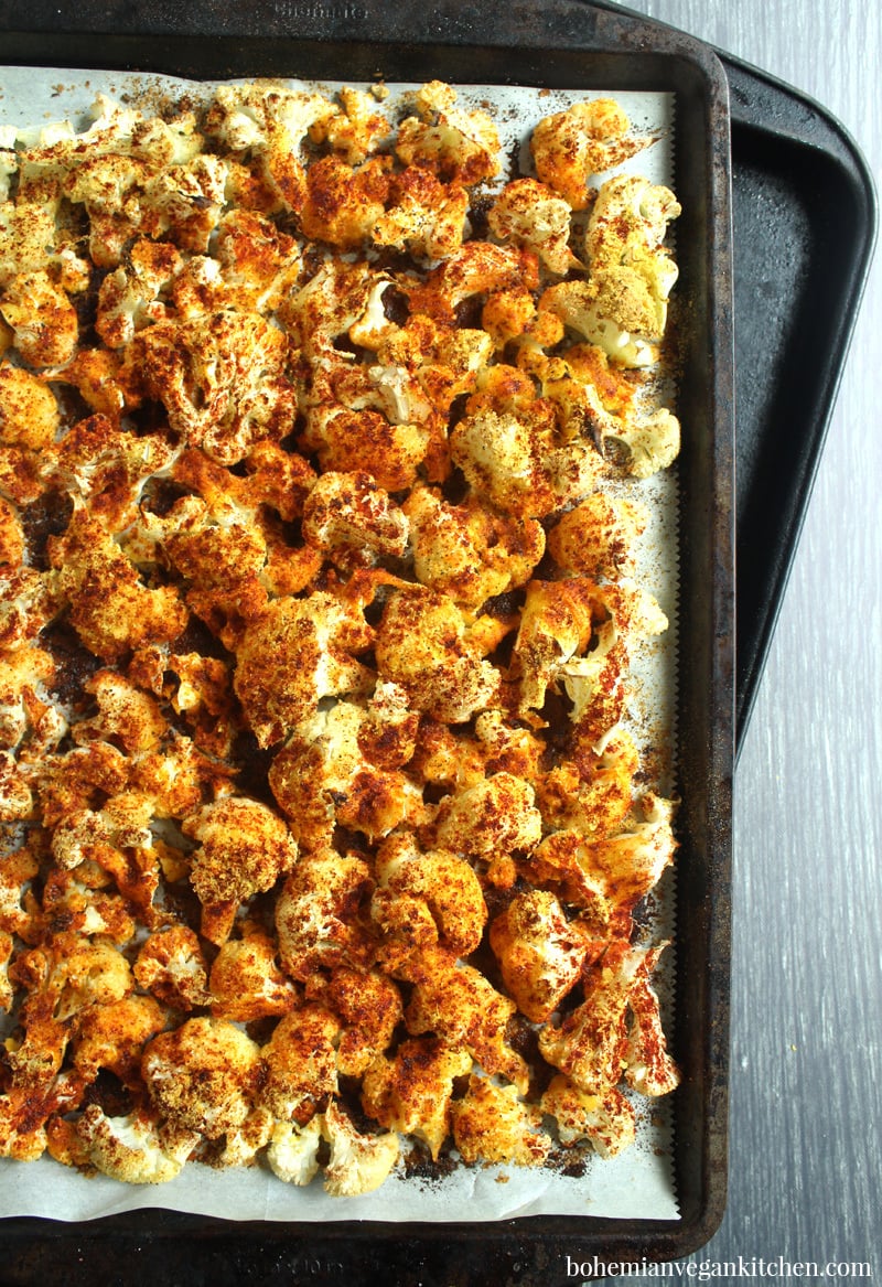 Want to know how to bake vegan cauliflower like a profesh? You’ve come to the right place! With less than 10 minutes prep time (and practically zero cutting involved), you can have deliciously roasted cauliflower in under 30 minutes! Use this for a number of vegan recipes, including as a meat OR tofu substitute. #howtobakecauliflowerintheoven #howtobakecauliflower #bakedcauliflower #bakedcauliflowerrecipe #bohemianvegankitchen