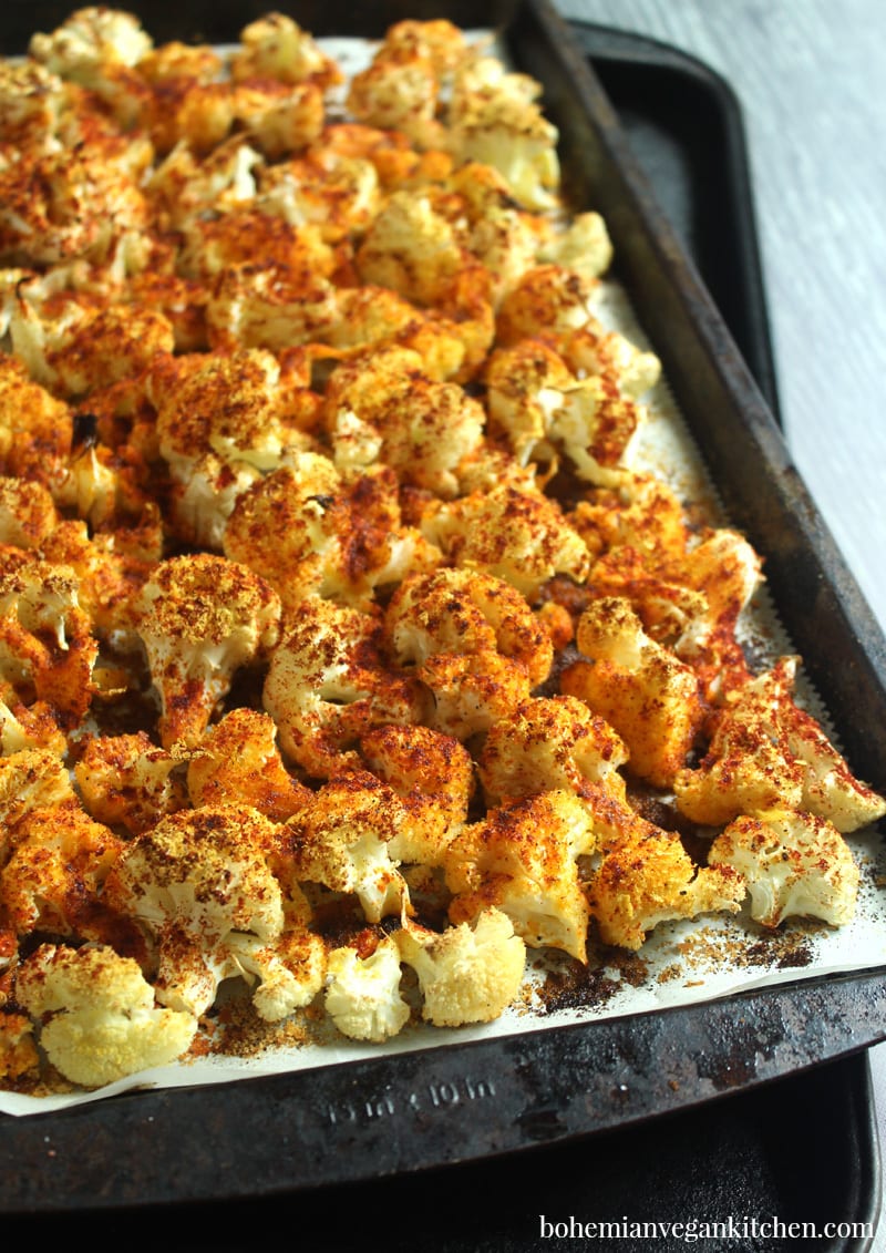 Want to know how to bake vegan cauliflower like a profesh? You’ve come to the right place! With less than 10 minutes prep time (and practically zero cutting involved), you can have deliciously roasted cauliflower in under 30 minutes! Use this for a number of vegan recipes, including as a meat OR tofu substitute. #howtobakecauliflowerintheoven #howtobakecauliflower #bakedcauliflower #bakedcauliflowerrecipe #bohemianvegankitchen