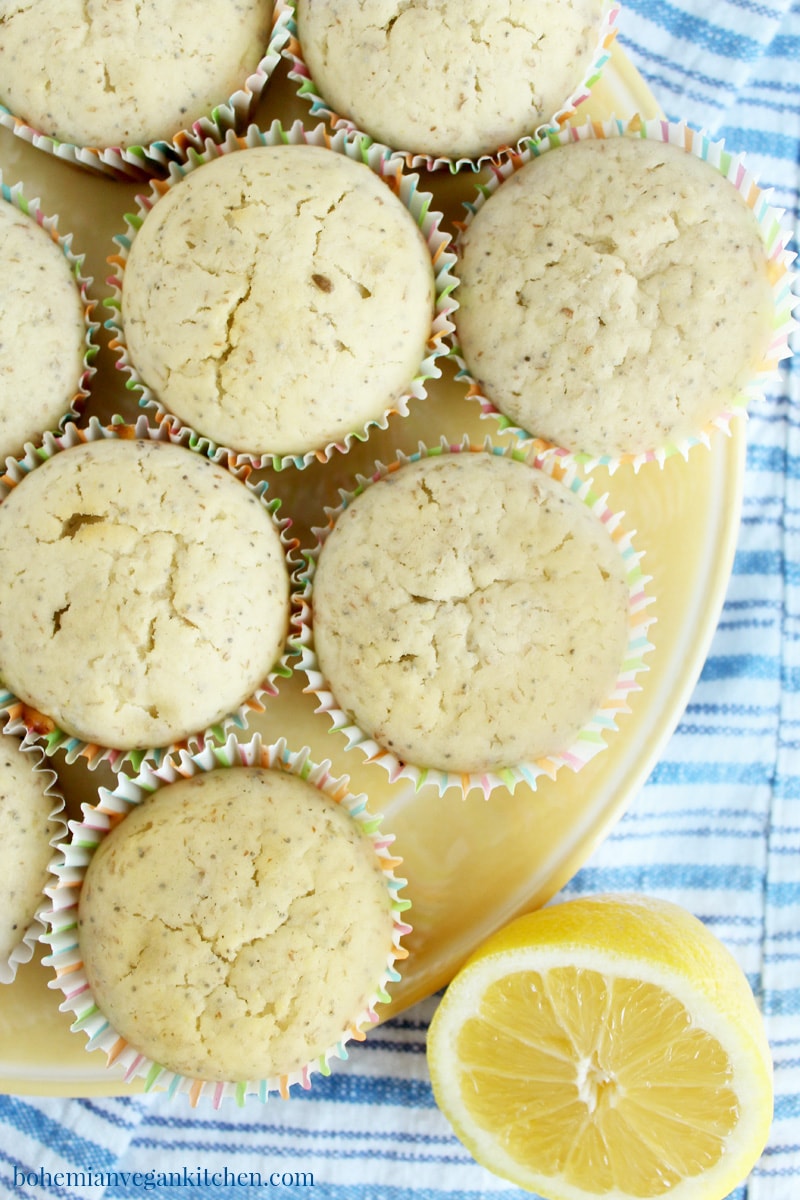 When life gives you lemons, forget making lemonade and make vegan lemon poppy seed muffins instead! Bursting with lemon-y flavor + packed with delicious poppy seeds, these muffins are the perfect breakfast muffin or on-the-go snack. Can easily be made gluten-free with a simple switch of flour. #veganlemonpoppyseedmuffins #veganlemonmuffins #veganlemonmuffinshealthy #veganlemonmuffinsdairyfree #veganlemonmuffinsglutenfree #veganlemonmuffinsrecipe #bohemianvegankitchen