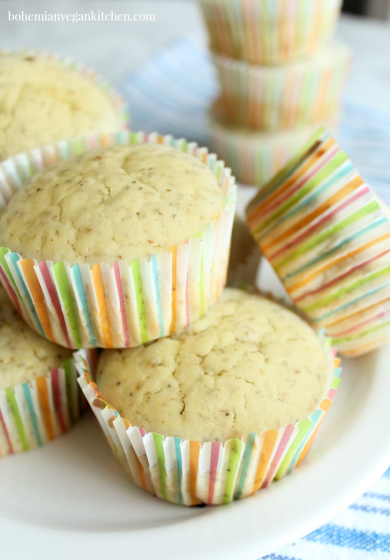 When life gives you lemons, forget making lemonade and make vegan lemon poppy seed muffins instead! Bursting with lemon-y flavor + packed with delicious poppy seeds, these muffins are the perfect breakfast muffin or on-the-go snack. Can easily be made gluten-free with a simple switch of flour. #veganlemonpoppyseedmuffins #veganlemonmuffins #veganlemonmuffinshealthy #veganlemonmuffinsdairyfree #veganlemonmuffinsglutenfree #veganlemonmuffinsrecipe #bohemianvegankitchen