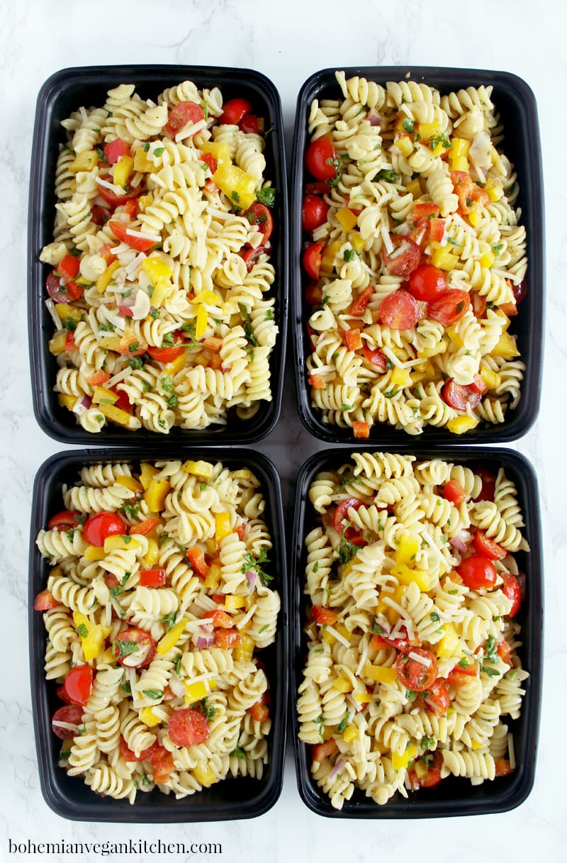 Be prepared for the week ahead with this simple + flavorful vegan pasta salad! Easy to pull together, this pasta salad can be made from start to finish in 20 minutes, leaving you more time to relax before you start your workweek. #veganpastasalad #veganpastasaladrecipes #veganpastasaladitalian #veganpastasaladeasy #bohemianvegankitchen