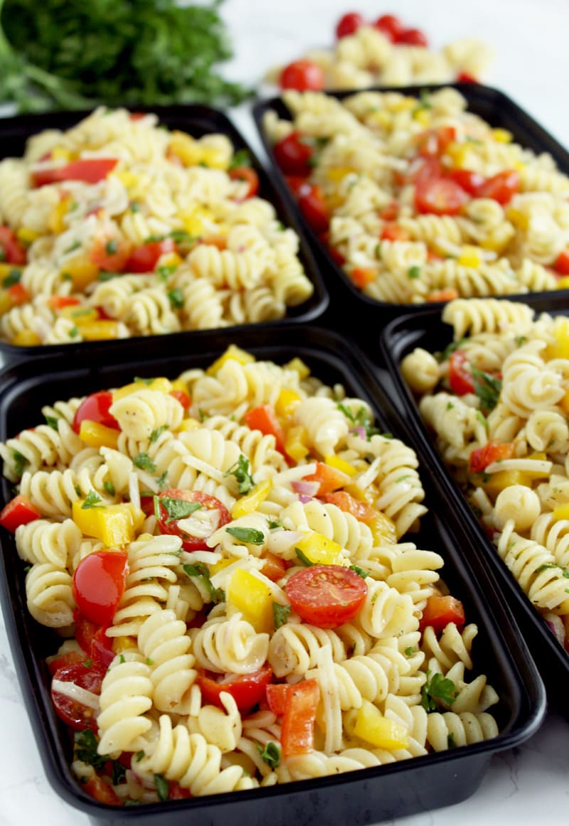 Be prepared for the week ahead with this simple + flavorful vegan pasta salad! Easy to pull together, this pasta salad can be made from start to finish in 20 minutes, leaving you more time to relax before you start your workweek. #veganpastasalad #veganpastasaladrecipes #veganpastasaladitalian #veganpastasaladeasy #bohemianvegankitchen