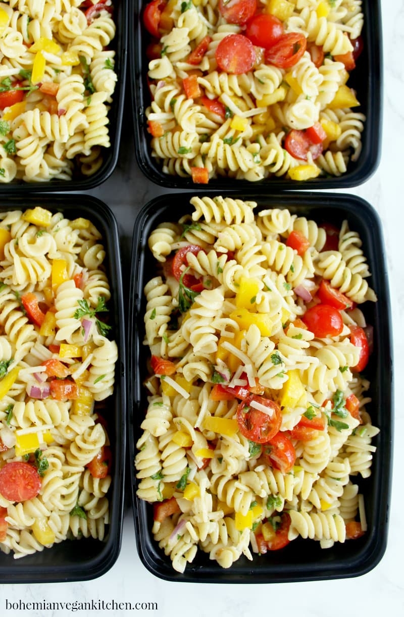 Be prepared for the week ahead with this simple + flavorful vegan pasta salad! Easy to pull together, this pasta salad can be made from start to finish in 20 minutes, leaving you more time to relax before you start your workweek. #veganpastasalad #veganpastasaladrecipes #veganpastasaladitalian #veganpastasaladeasy #bohemianvegankitchen