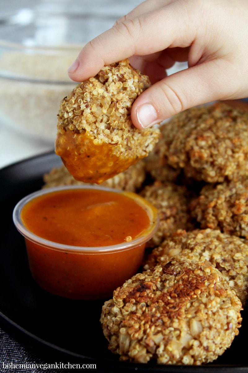 Nuggets are here to stay as one of the top kids foods of all time, right next to pizza and hamburgers. Serve your kids healthy quinoa vegan nuggets that are 100% soy-free and gluten-free, while also packing hidden veggies for an added bonus. Great for kids lunches and easy dinners! #veganchickennuggets #veganchickennuggetsbaked #veganchickennuggetseasy #veganchickennuggetskids #bohemianvegankitchen