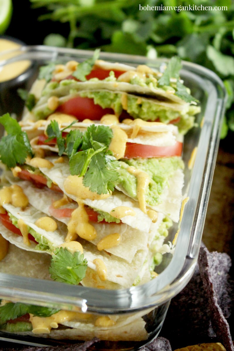 This lunch is so easy, it will have you saying "Yo quiero avocado quesadillas" faster than a talking chihuahua! A snap to pull together, plus totally customizable, you can have this lunch ready to go in only a few short minutes. Perfect for weekday lunches or a lazy dinner. #avocadoquesadilla #avocadoquesadillarecipes #avocadoquesadillavegan #avocadoquesadillacheese #avocadoquesadillahealthy #bohemianvegankitchen