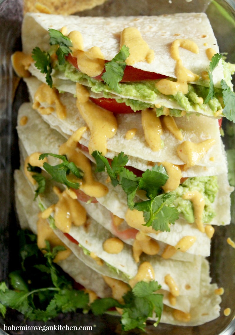 This lunch is so easy, it will have you saying "Yo quiero avocado quesadillas" faster than a talking chihuahua! A snap to pull together, plus totally customizable, you can have this lunch ready to go in only a few short minutes. Perfect for weekday lunches or a lazy dinner. #avocadoquesadilla #avocadoquesadillarecipes #avocadoquesadillavegan #avocadoquesadillacheese #avocadoquesadillahealthy #bohemianvegankitchen