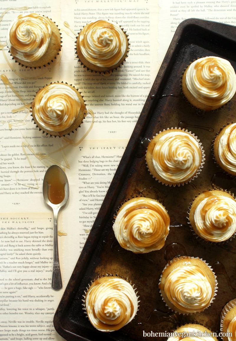 Enjoy any special occasion and impress muggles with these moan-worthy Harry Potter vegan cupcakes! In honor of the famous wizarding drink, these butterbeer cupcakes are simple to make and do not require any artificial ingredients. #harrypottervegan #harrypotterveganrecipes #harrypottervegancake #butterbeercupcakes #butterbeercupcakesvegan #butterbeercupcakeseasy #bohemianvegankitchen