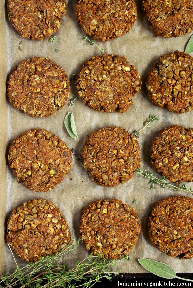 overhead picture of lentil patties on a baking sheet.