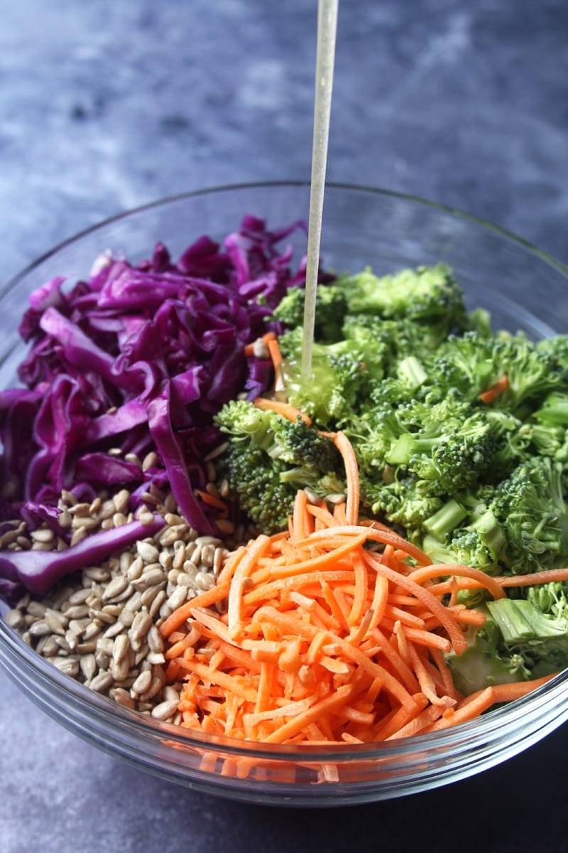 salad dressing drizzled on top of this healthy broccoli salad