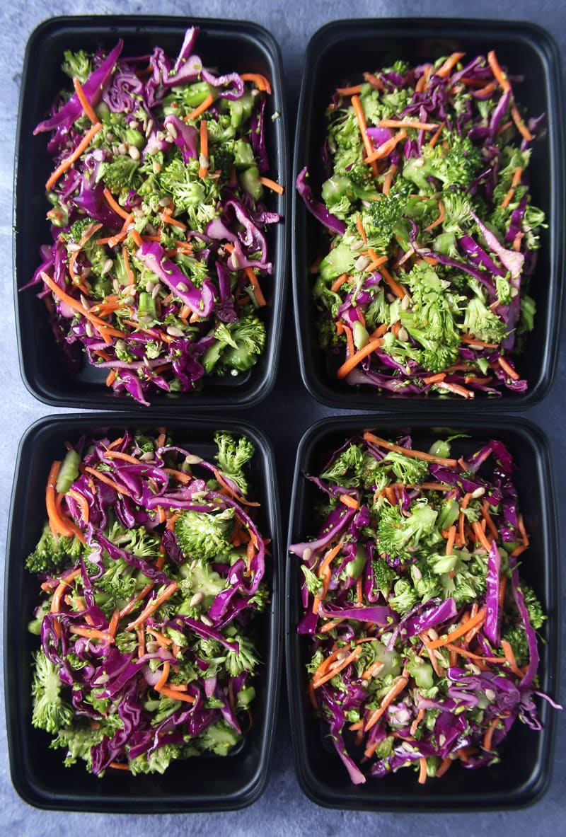 healthy broccoli detox salad separated into meal prep containers