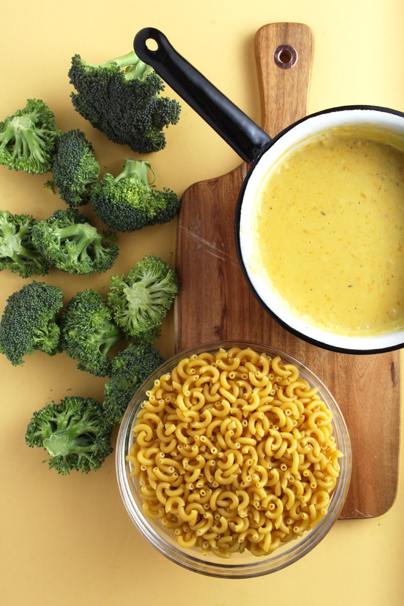 picture of dairy-free cheese sauce with macaroni pasta and broccoli.