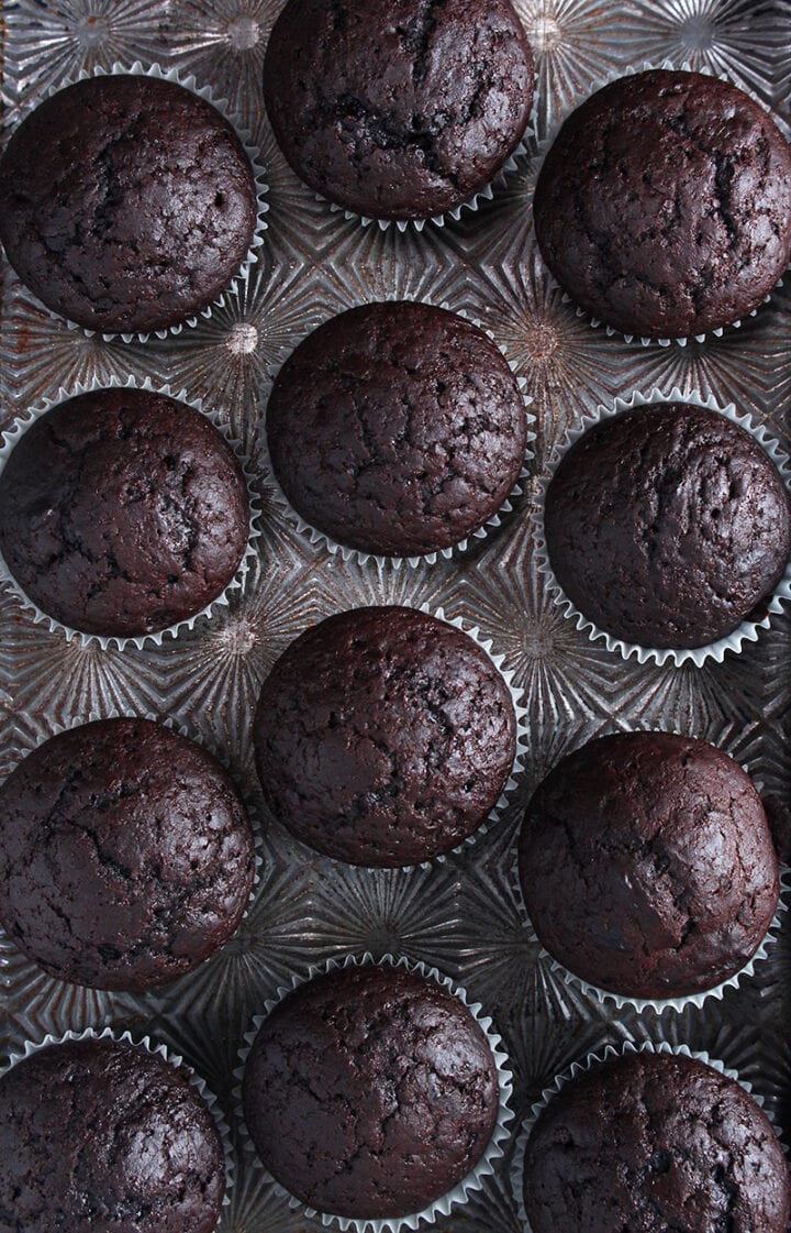 more vegan chocolate cupcakes on a vintage baking tray 