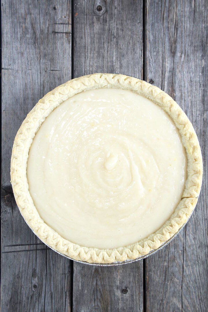 picture of the lemon pudding poured into a cooled pie shell.