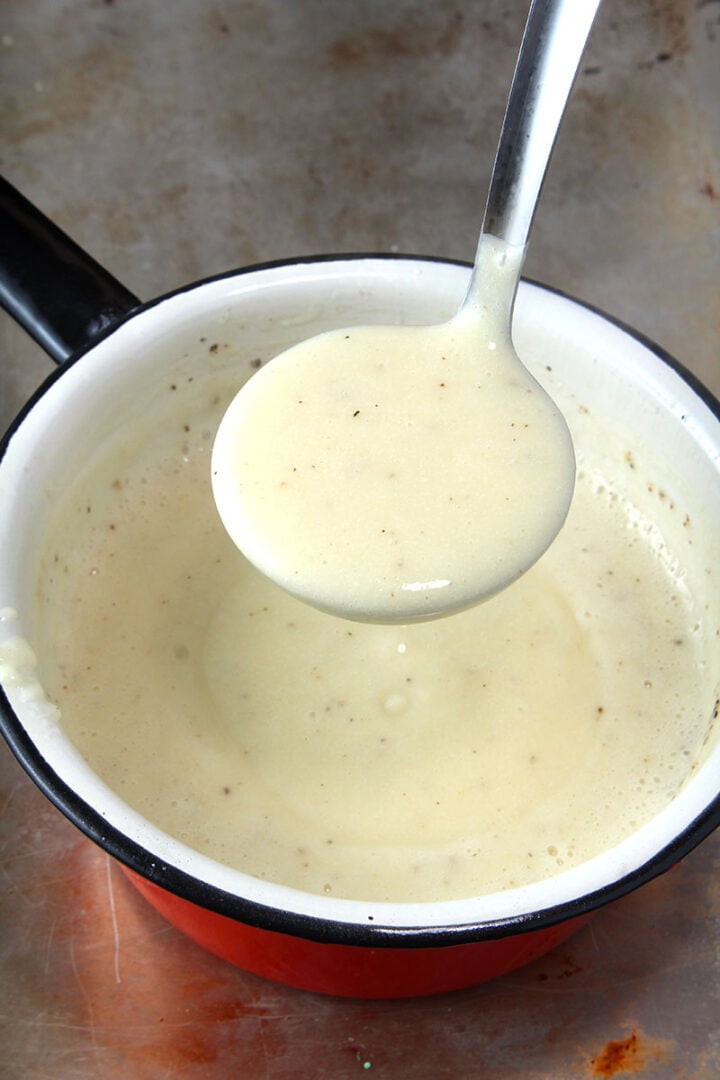 picture of a ladle of vegan gravy
