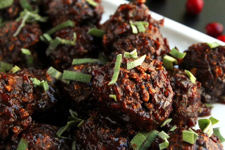 picture of black bean meatballs and sage sprinkled on top