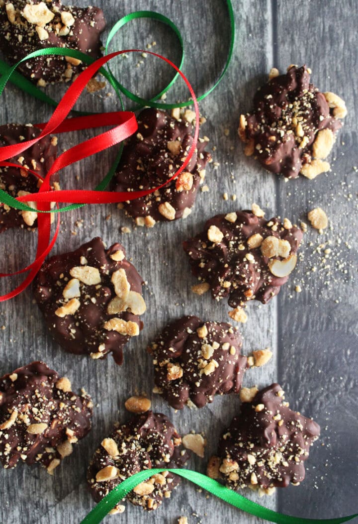 overhead picture of vegan chocolate cashew clusters with ribbon