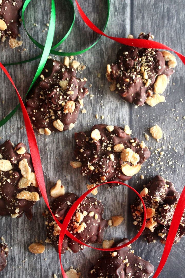 more vegan chocolate cashew clusters, ready for Christmas on a tabletop 