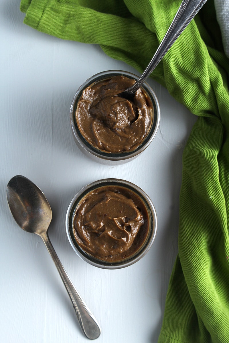 picture of two cups overhead with chocolate avocado pudding